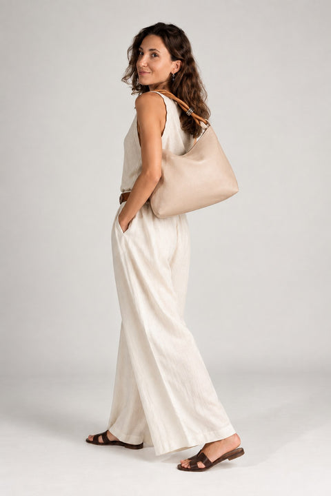 Leather shoulder bag worn by a model