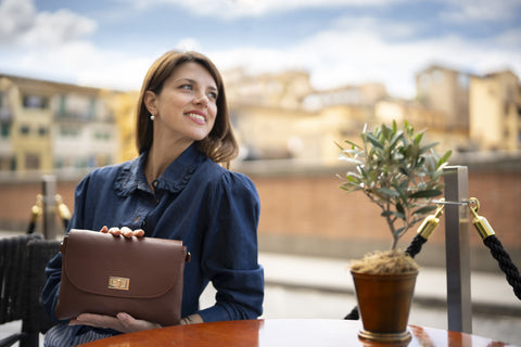 Leather crossbody bag worn by a model